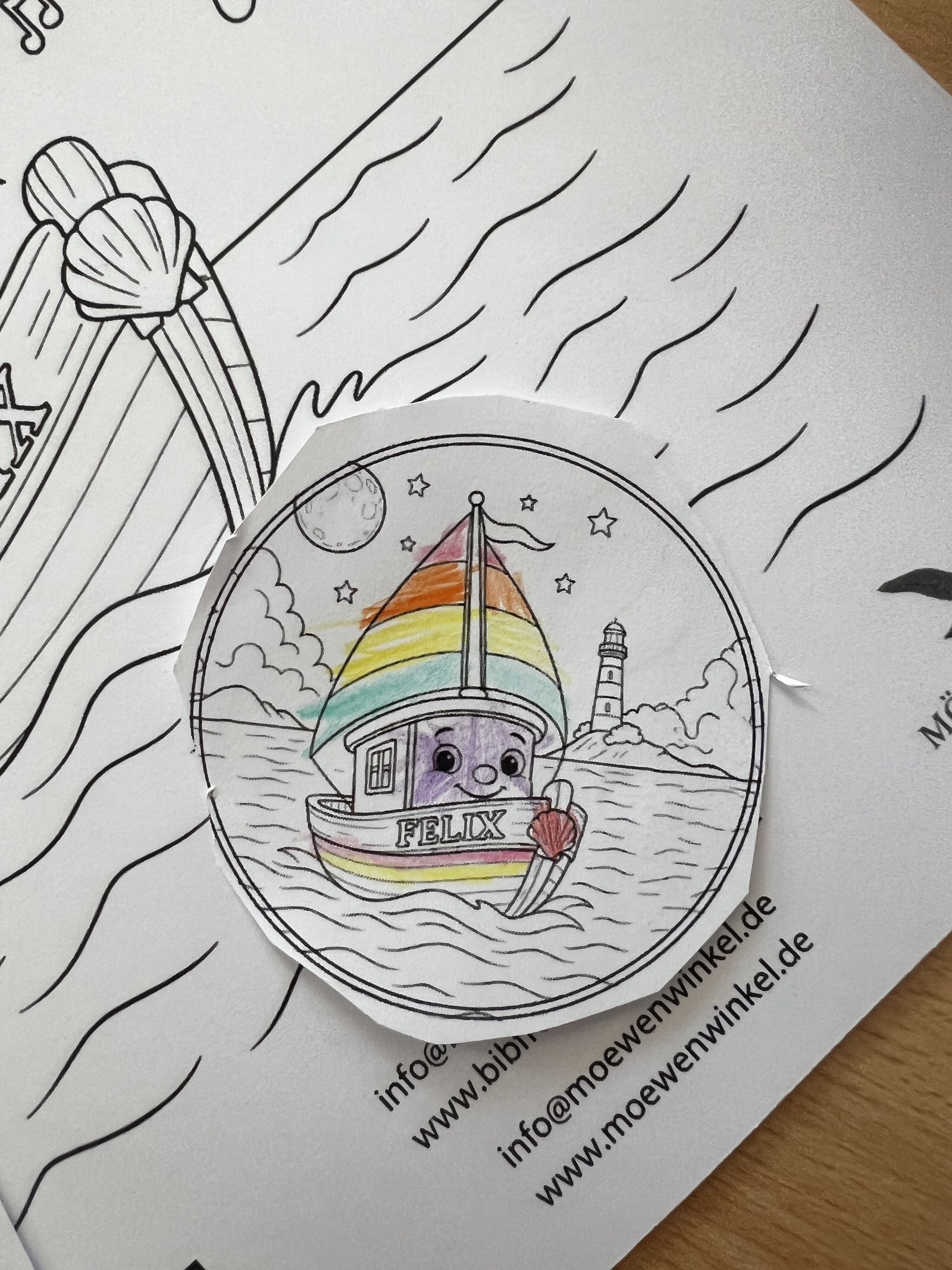 Selbst gestalteter Felix-Button auf einem Ausmalbild